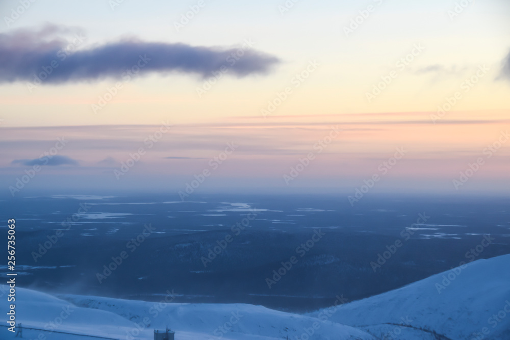 sunset in the mountains in the tundra everywhere white snow nobody landscape road sunset in the mountains in the tundra everywhere white snow nobody landscape road