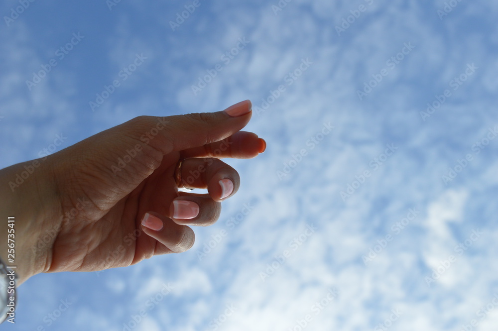 Hand in sky