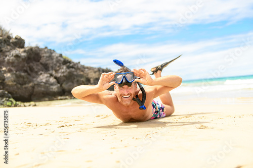 man with mask for snorkling at the seaside beach © Louis-Photo