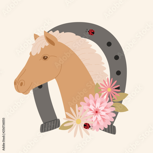 Brown horse portrait in a horseshoe with flowers