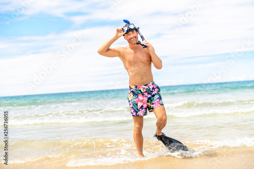 man with mask for snorkling at the seaside beach
