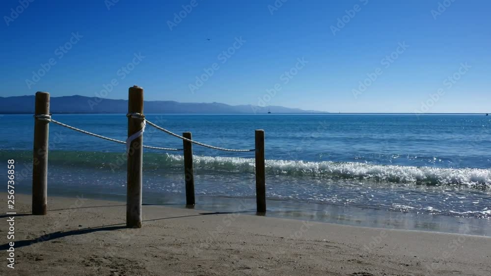 Sea In Sardinia In Spring People Strolling, Lean And Take The Sun 4K Video