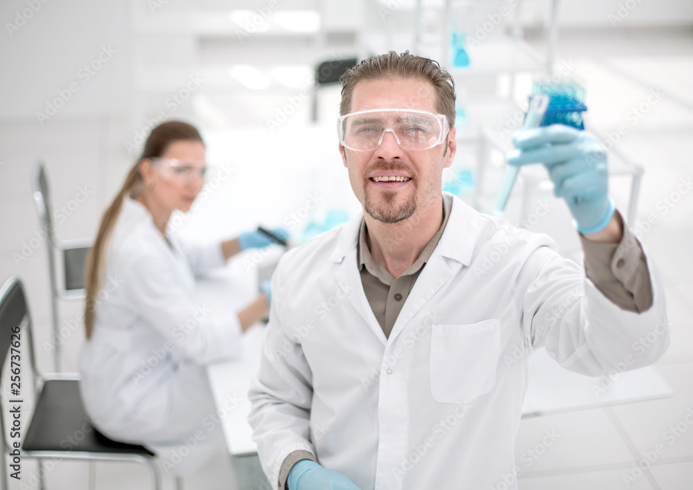 successful scientist checking the results of the examination. successful scientist checking the results of the examination.