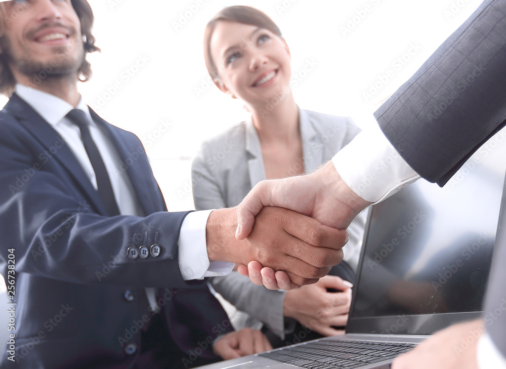 Two confidence businessman shaking hands close-up Two confidence businessman shaking hands close-up