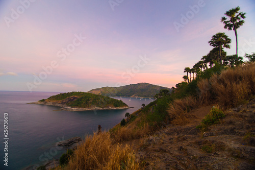 Sea coastline sunset island with colourful sky cloud © themorningglory