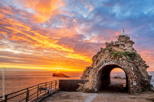 Biarritz, France, Rock of the Virgin on dramatical sunset photo