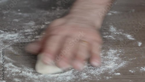  Caucasian man doing traditional  pita bread at home .Natural food concept .