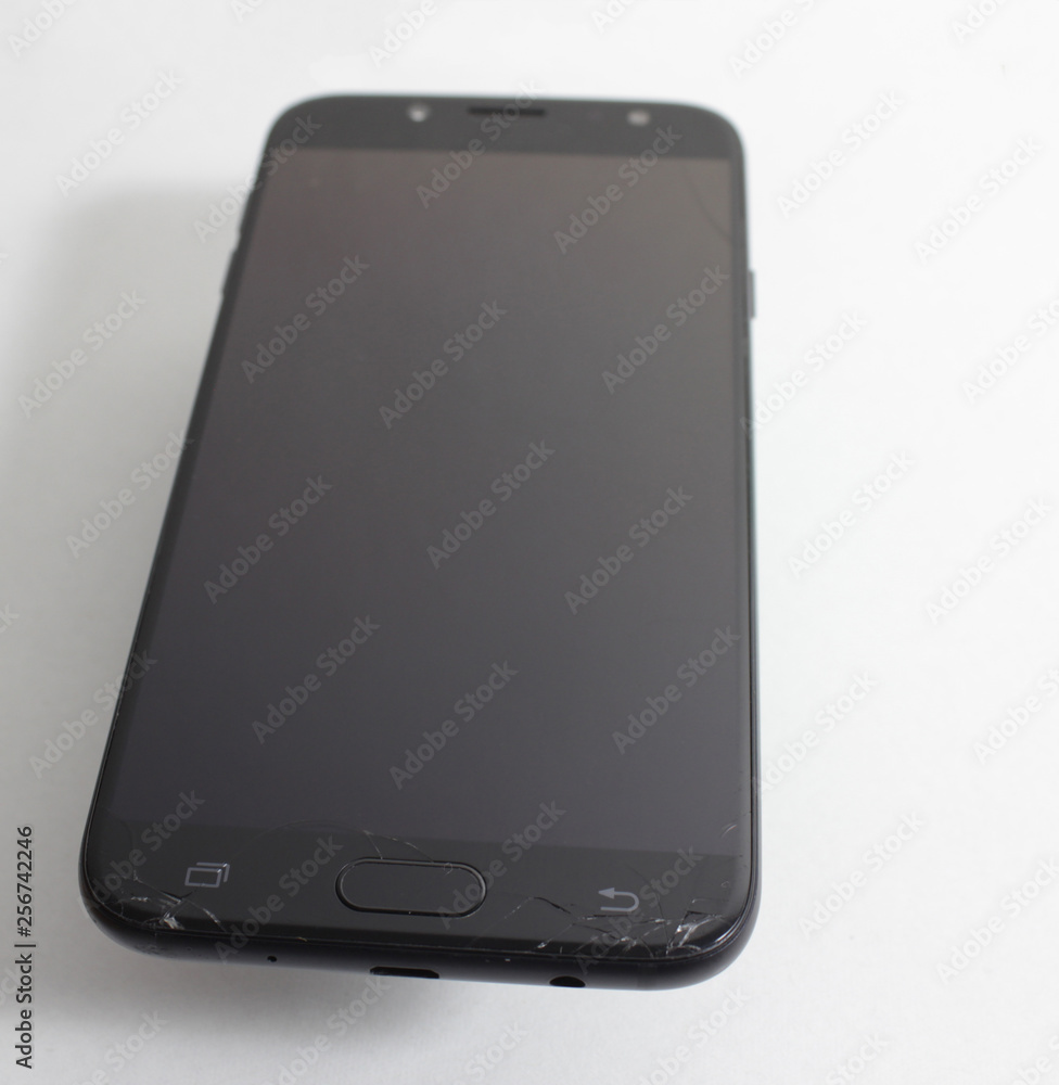 Smartphone smashed into small pieces display. Smartphone smashed into small pieces display.