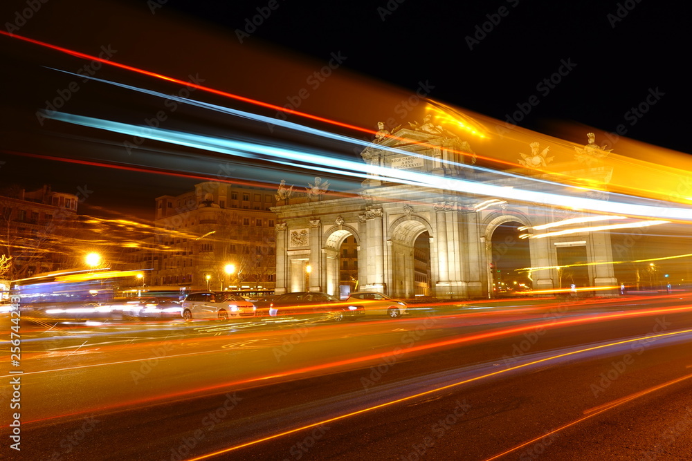 The Puerta de Alcala.  Alcala Gate is a Neo-classical monument in the Plaza de la Independencia in Madrid.