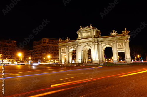 The Puerta de Alcala. Alcala Gate is a Neo-classical monument in the Plaza de la Independencia in Madrid.