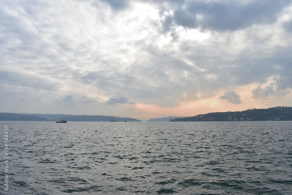 Sunset on the Bosphorus.ships passing through the Bosphorus.