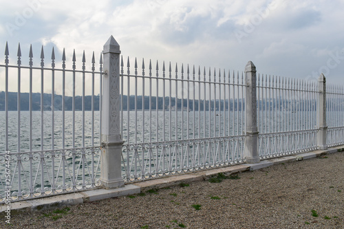 Iron railing near the beautiful Istanbul Strait. iron fence. seaside iron fence