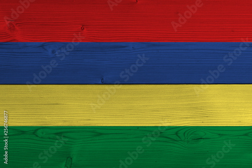 Mauritius flag painted on old wood plank