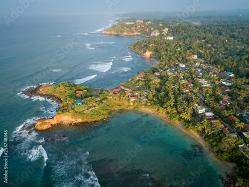 Aerial view of beautiful seascape with fisherman village in sri lanka