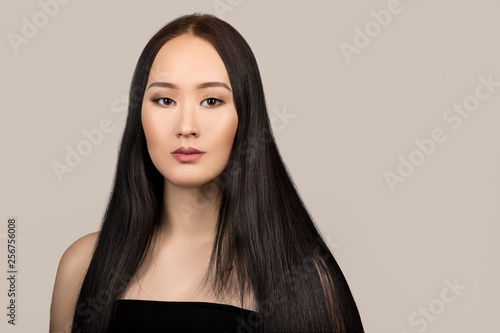 portrait asian woman. Gray background