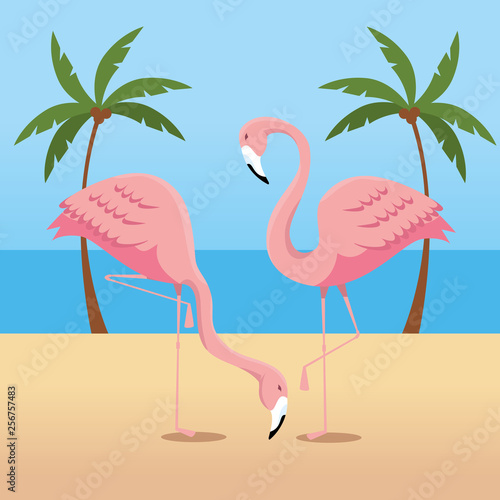 tropical flamingos with palms trees in the beach