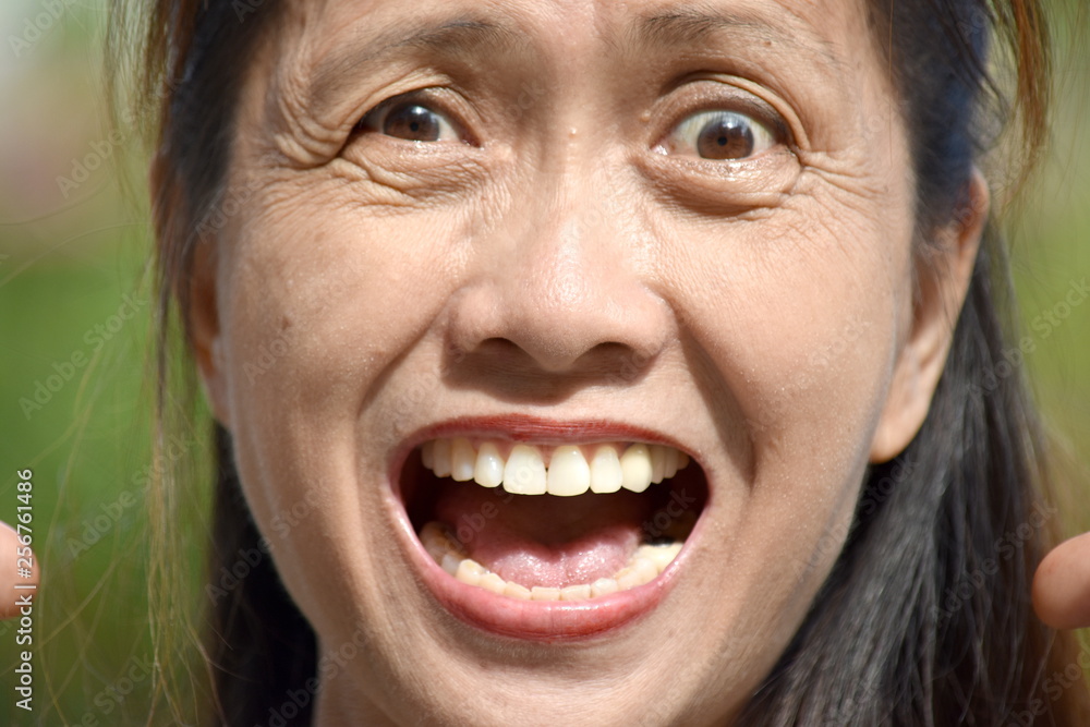 Stressed Older Filipina Person Stressed Older Filipina Person