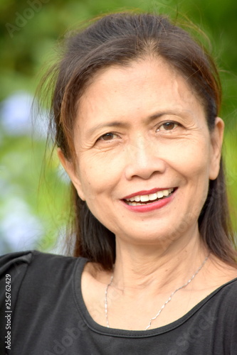 Asian Female Senior Smiling