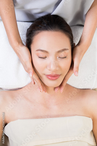 Ayurvedic Head Massage Therapy on facial forehead Master Chakra Point of Asian woman, Therapist Spa body woman hands treatment on customer to increase circulation release tension stress of think work