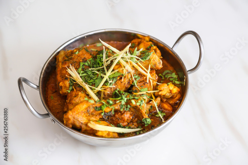 Tasty Arabic non vegetarian food cooked and placed in white bowl  on white background
