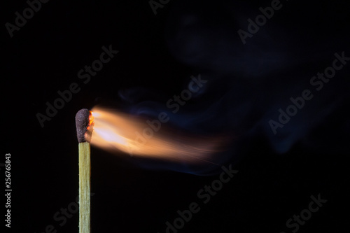 Matches with lights on a black background © Attapol