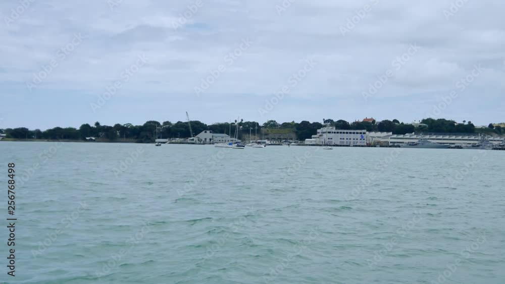wide shot of a marina with boats & yacht wide shot of a marina with boats & yacht