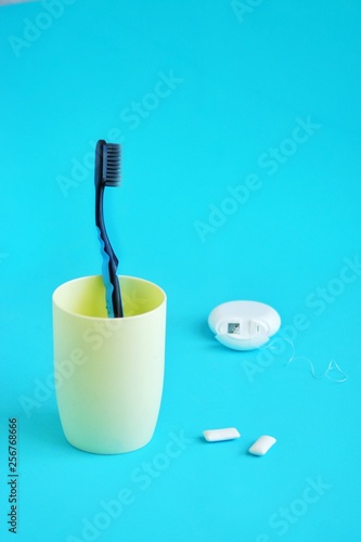 Oral hygiene, dental hygiene using dental tools, dental floss, irrigator, brush, chewing gum.