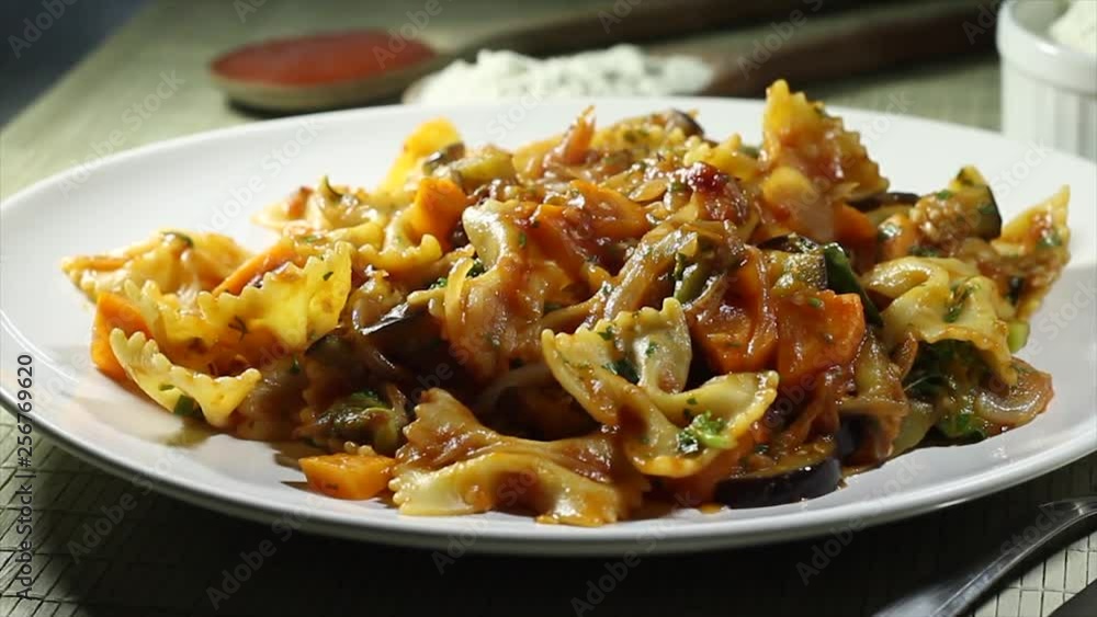 Delicious meal on a table with wooden tablecloth and warm smoke coming from the food Delicious meal on a table with wooden tablecloth and warm smoke coming from the food