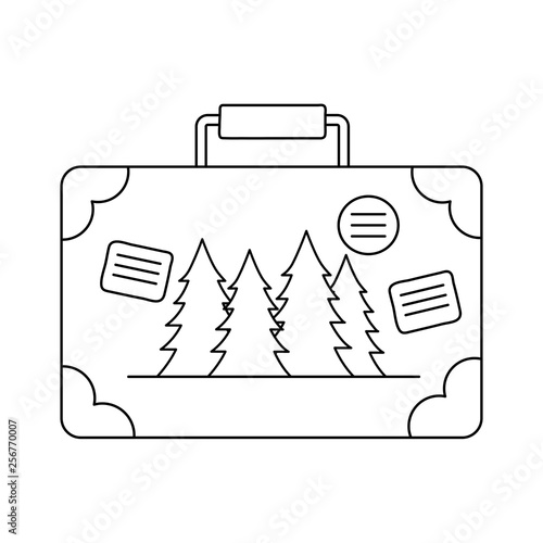 suitcase travel with pines forest