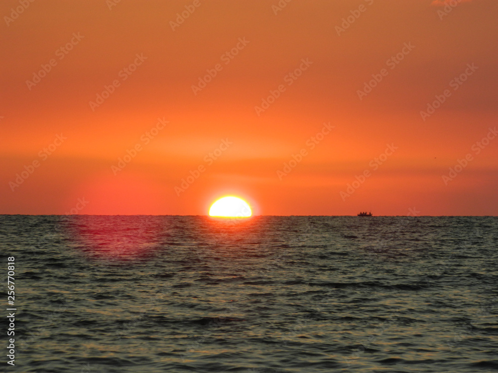 sunset, sea, sun, ocean, sky, water, sunrise, beach, orange, nature, horizon, evening, landscape, dusk, cloud, beautiful, clouds, coast, light, red, reflection, travel, yellow, golden, beauty