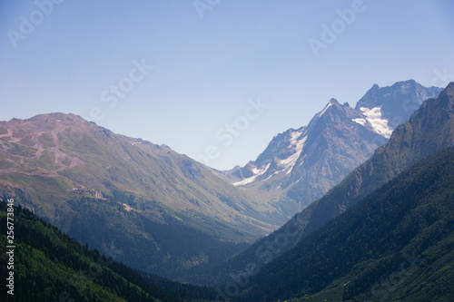 The surroundings of Dombai. Caucasus Mountains summer, clear day.