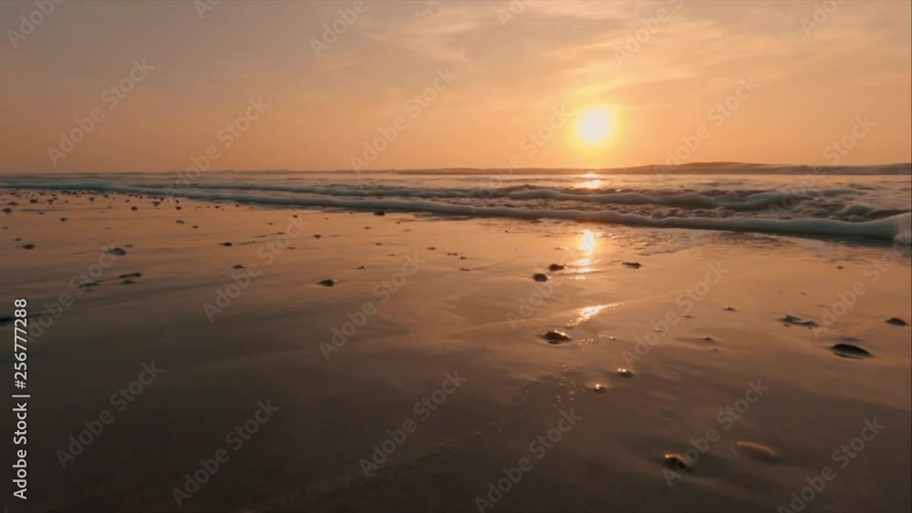 Vesterhavet in Denmark with a beautiful sunset. Calm waves. Vesterhavet in Denmark with a beautiful sunset. Calm waves.