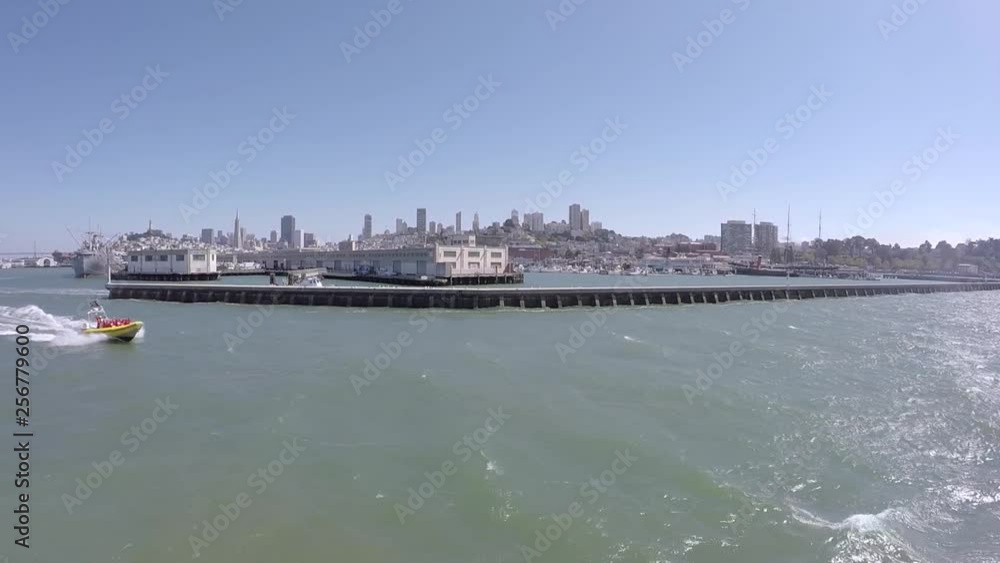 Motorboat driving fast at San Francisco's bay area Motorboat driving fast at San Francisco's bay area