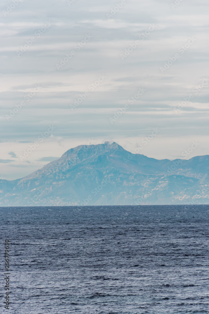 Mediterranean Sea with Mountains in the Distance on the Southern Italian Mediterranean Coast on a Cloudy Morning
