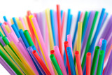 A pile of multicolored tubes for cocktails