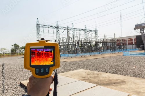 Thermoscan(thermal image camera), Industrial equipment used for checking the internal temperature of the machine for preventive maintenance, This is checking substation heat photo