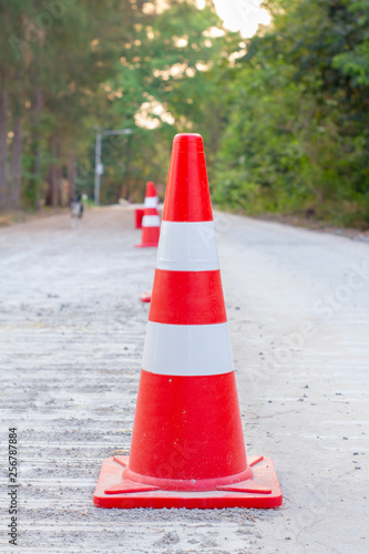 Traffic cones are placed on roads that are under construction.