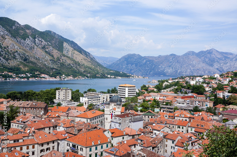 View on brick roofs of houses of old town Kotor near Kotor's lake.