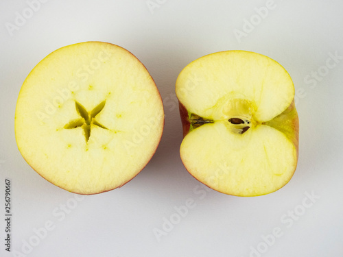 apple cut up and down, on a white background