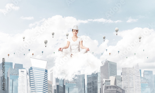 Young woman keeping mind conscious.