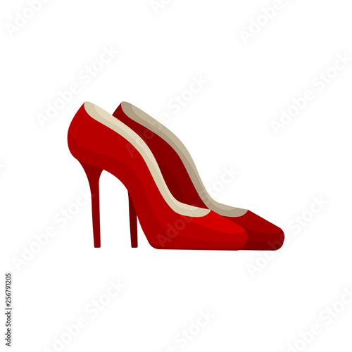 Red high heel shoes on white background.