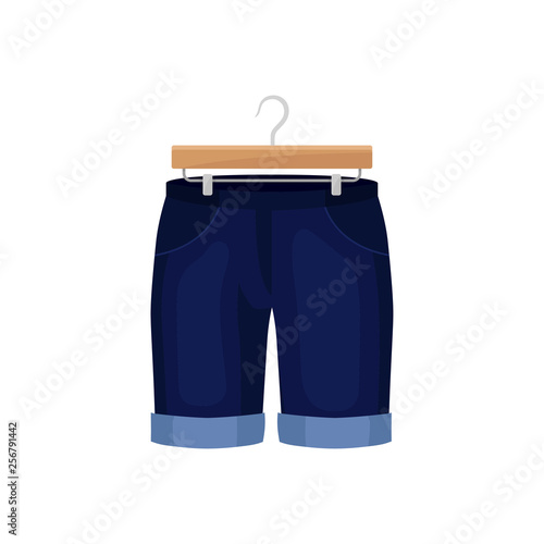 denim shorts on clothes hanger. Fashion concept.