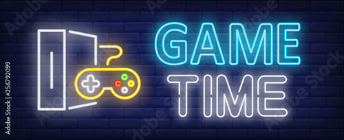 Game time neon text with game console and controller