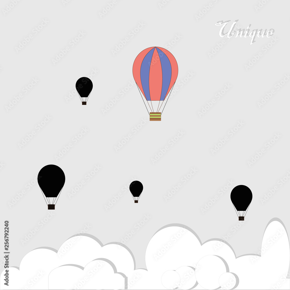 Black baloons and one colorful in competition on grey background 