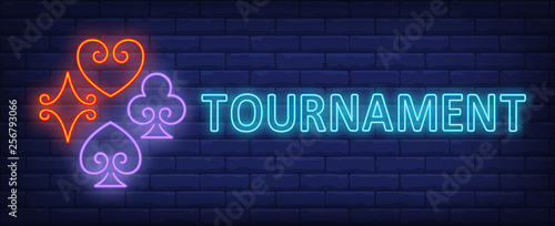 Tournament neon text with playing card suits
