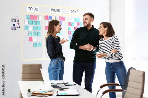 Young business people near ...