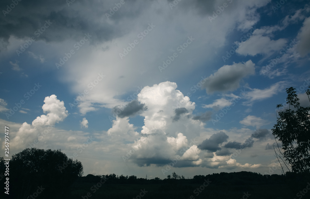 Obraz premium Blue sky with white clouds. Beautiful nature wallpapers background. Sutumn season nature.