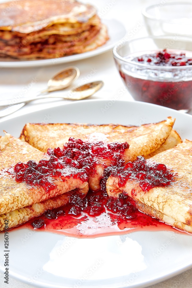 Healthy breakfast with fresh hot pancakes with berry jam Healthy breakfast with fresh hot pancakes with berry jam