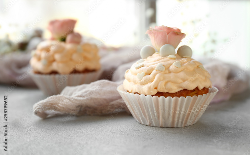 Tasty Easter cupcake on grey table Tasty Easter cupcake on grey table