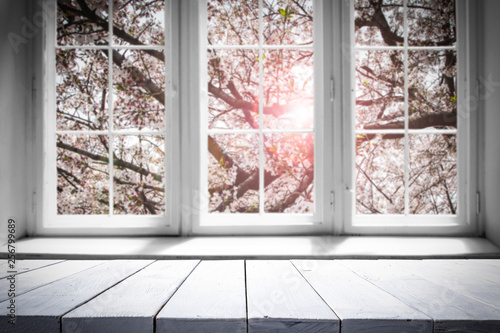 Desk of free space and spring window background 